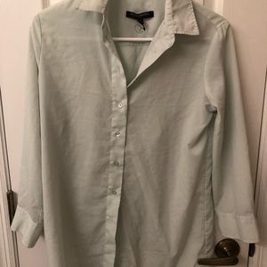 Light green blouse. Perfect for shorts or jeans.